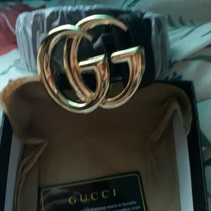 Black leather, gold leather G’s